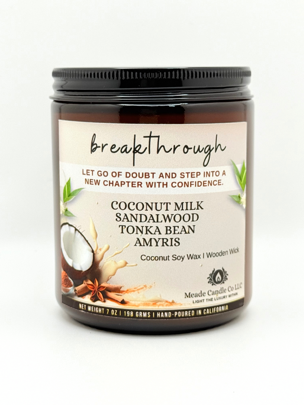 Scented candle jar with 'breakthrough' label.