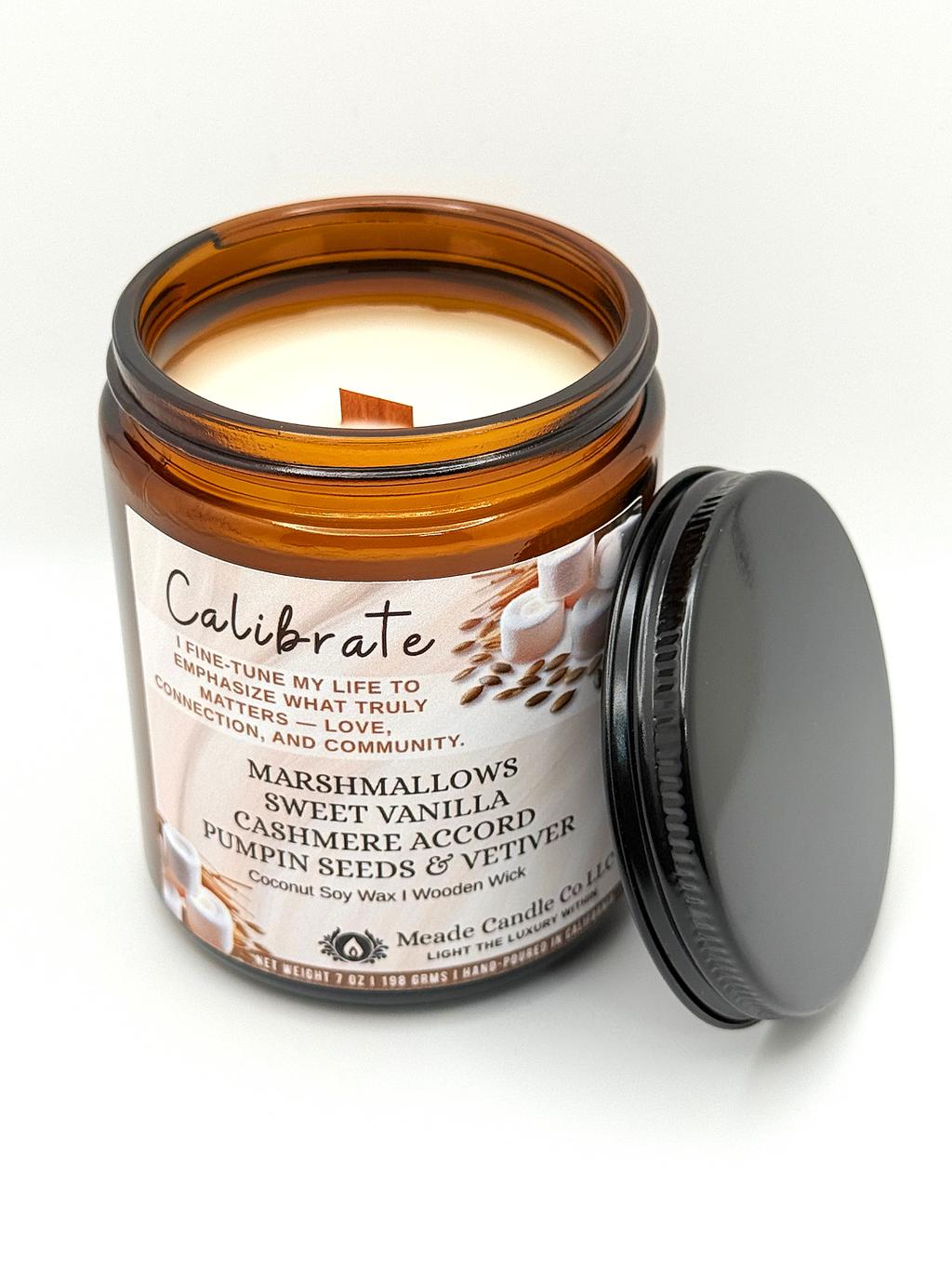 A candle that says Calibrate.